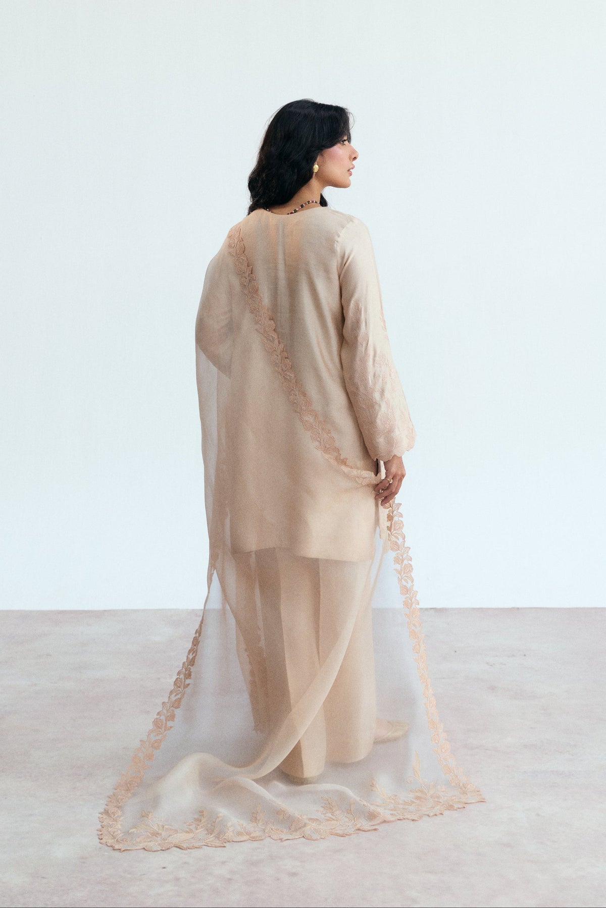 Back view of the Peony Set — rayon kameez, raw silk trousers, and organza dupatta with floral cutwork embroidery