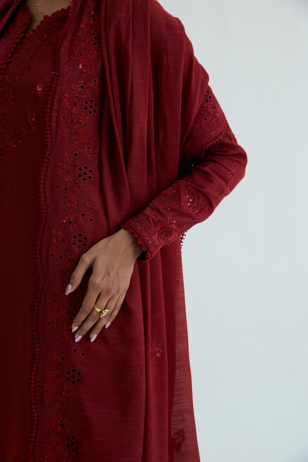 Embroidered sleeve detail on deep red maroon kameez