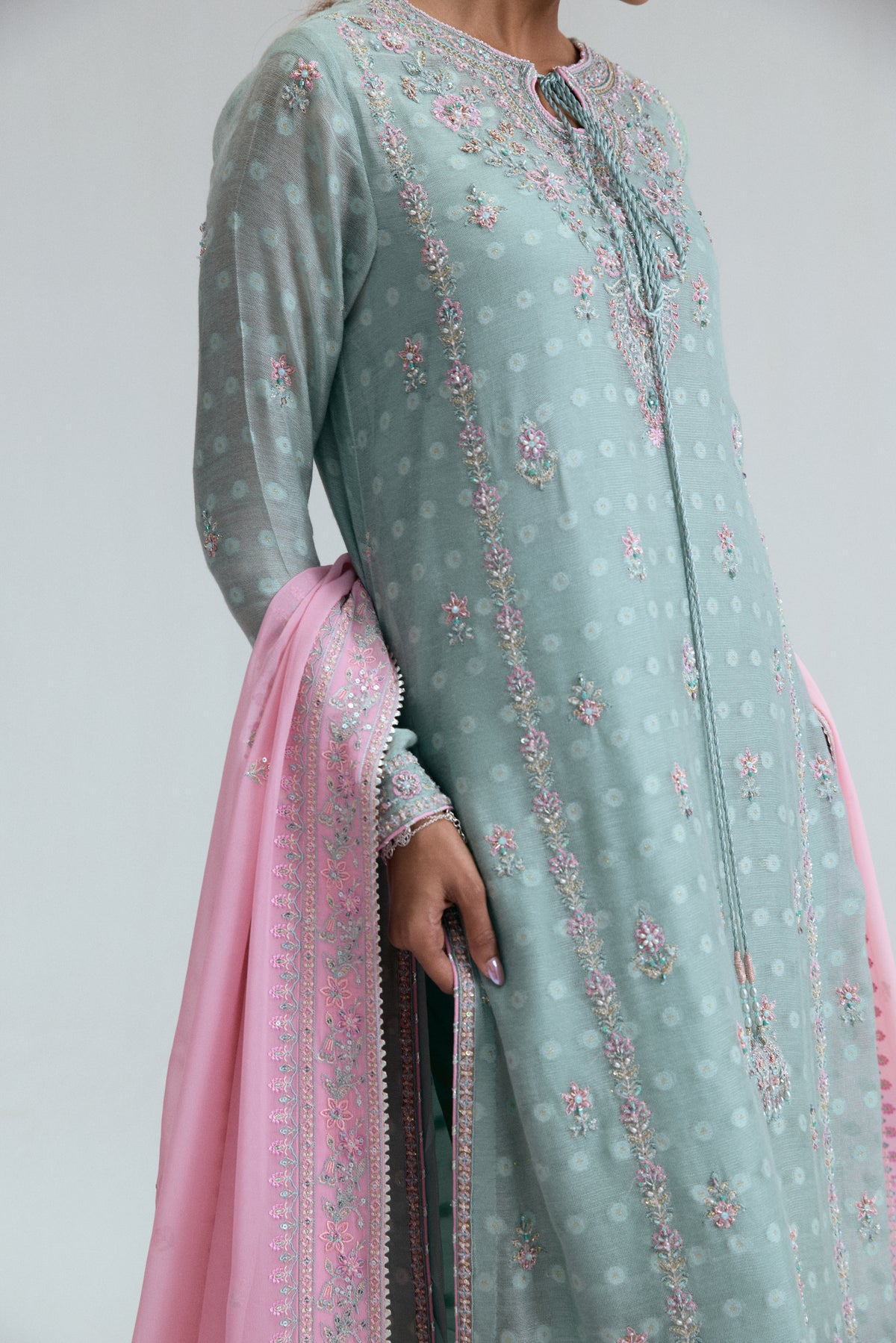 Azure Set neckline detail showing tie-string and pink embroidered patterns with crystal accents — Pakistani formal kameez UK