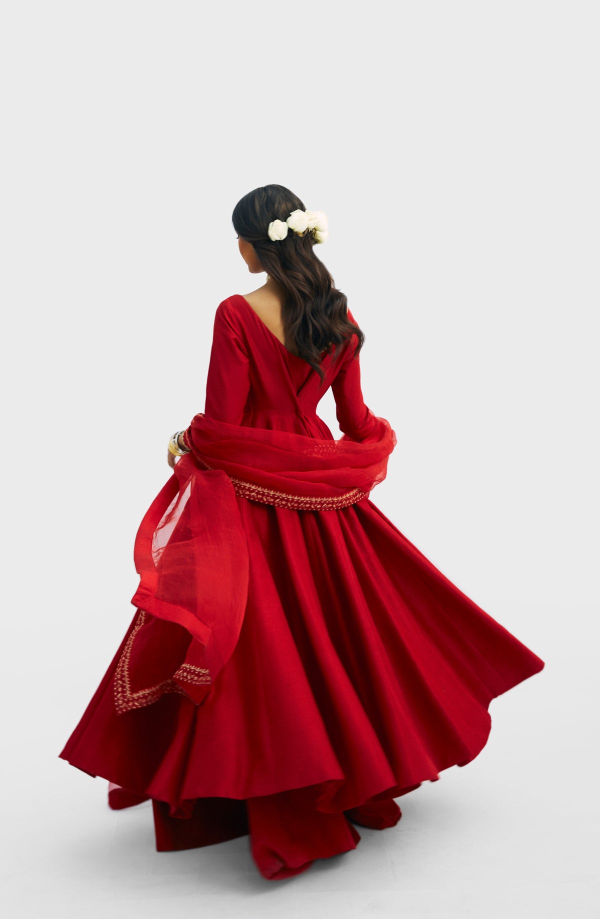 Women wearing Mannam Red Peshwas Set — red raw silk peshwas with hand-embellished neckline and embroidered organza dupatta