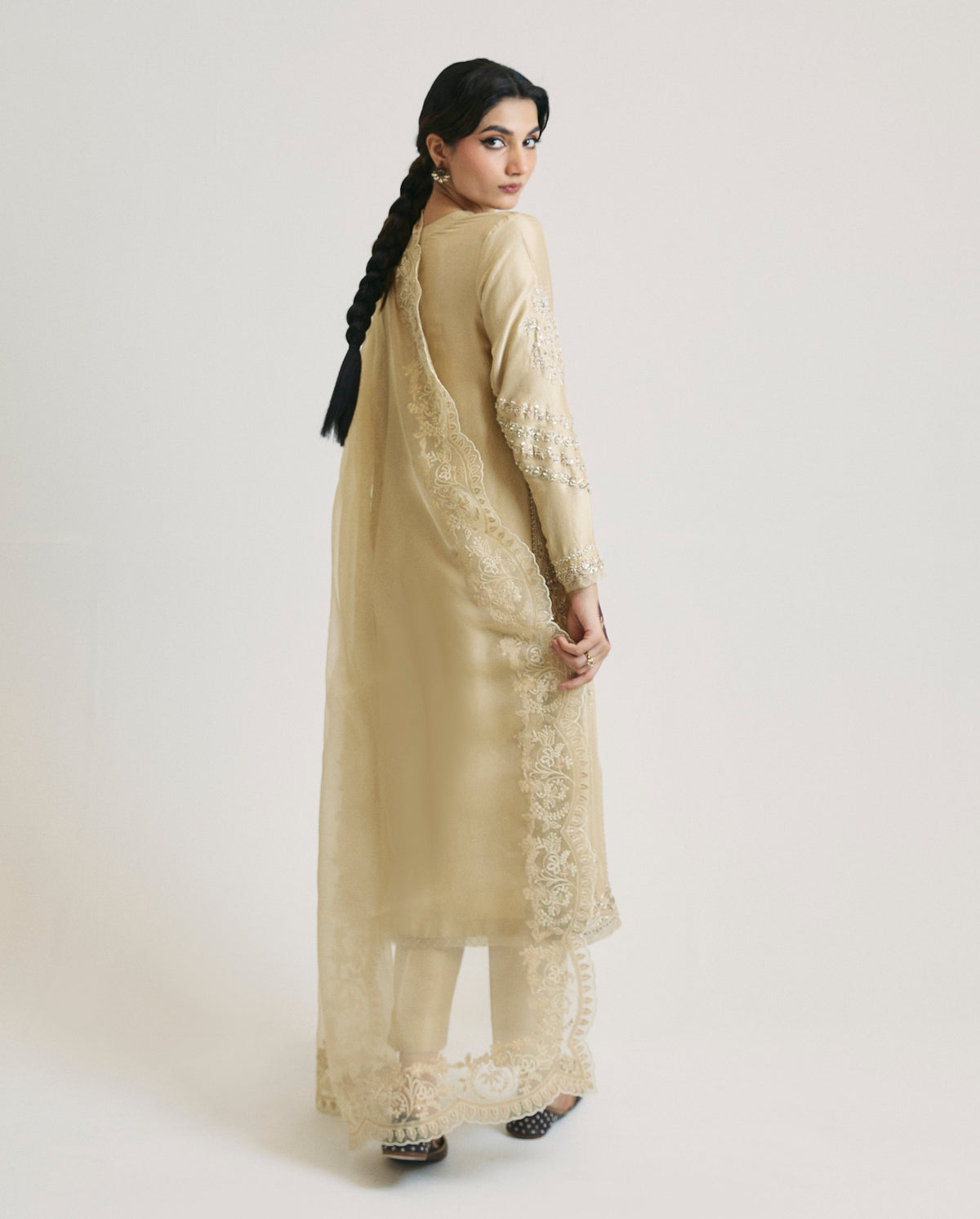gold traditional Pakistani suit luxury formal wear for wedding events
