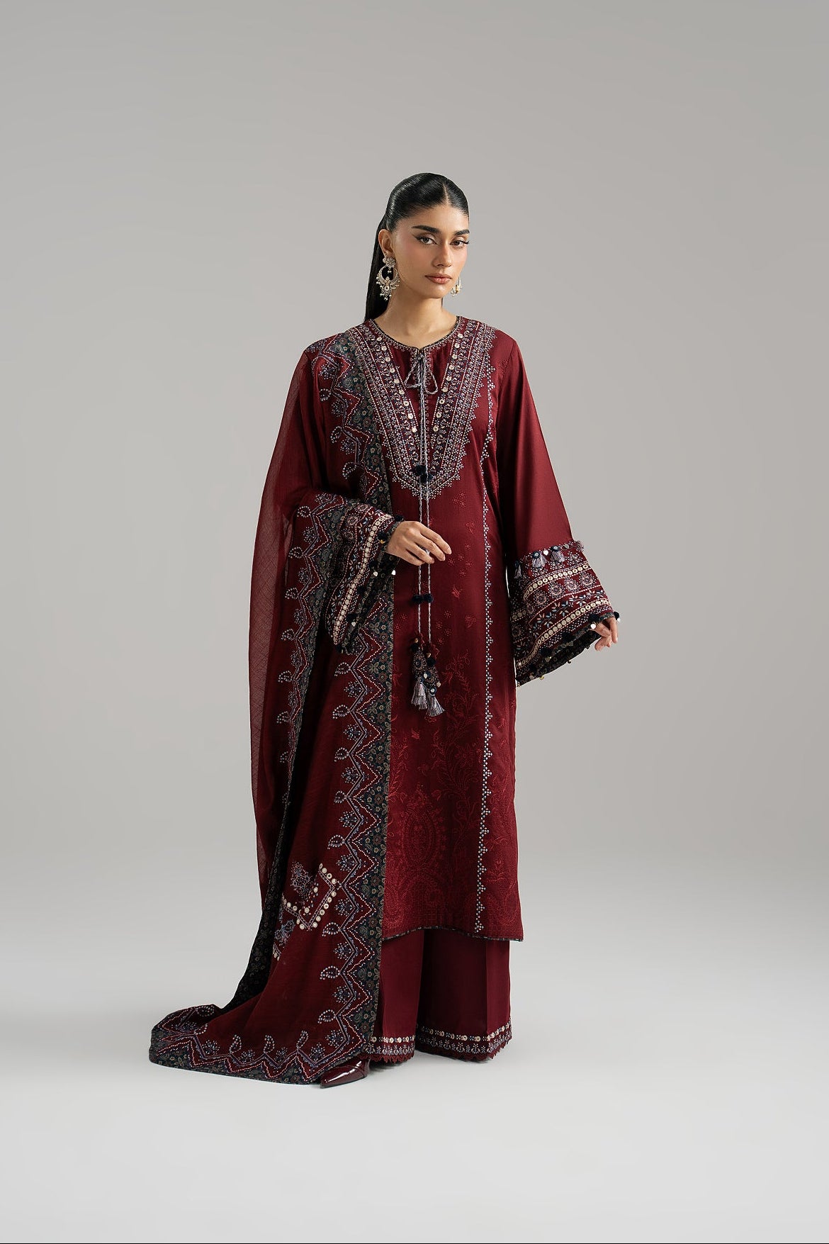 Saffron Set full look — deep maroon cotton long kameez with ajrak accents and tassels