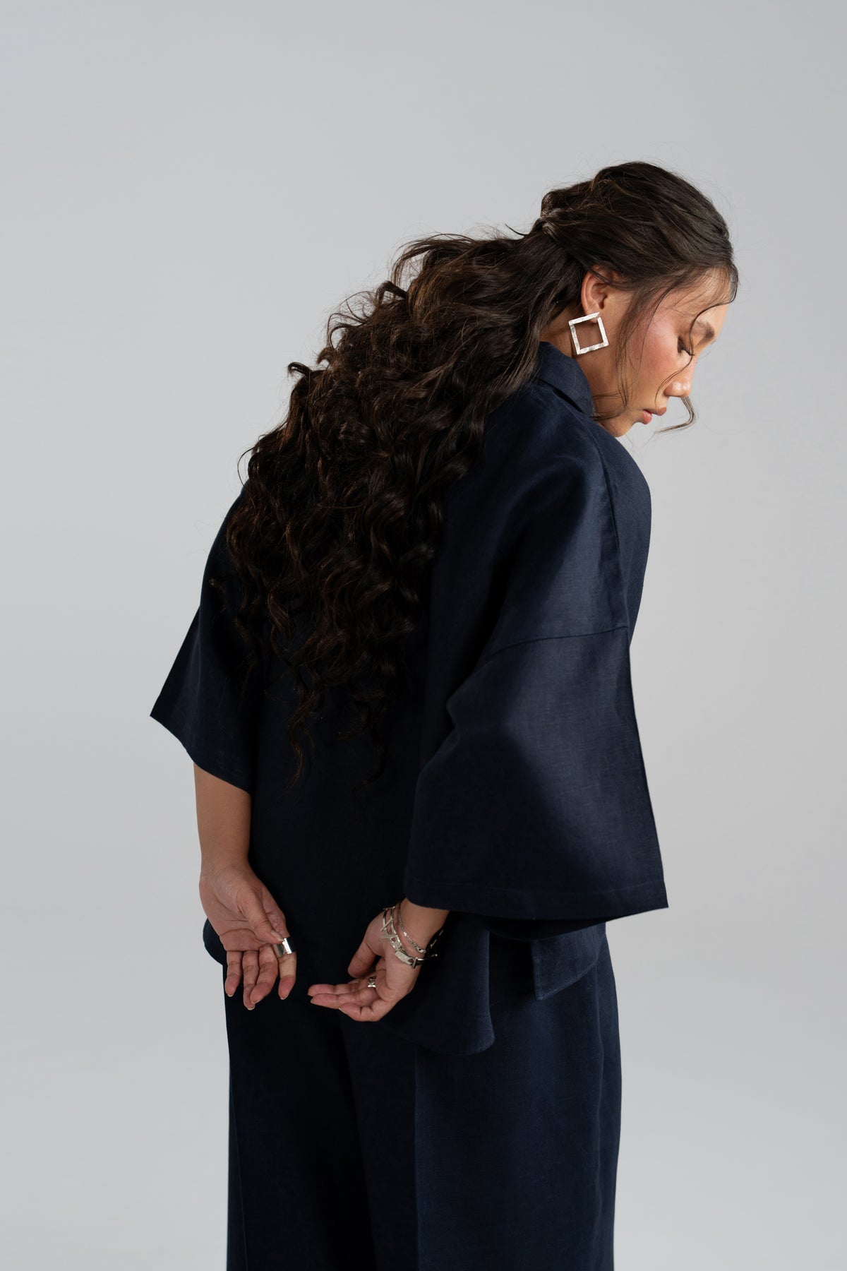 shirt in motion, wide sleeve drape