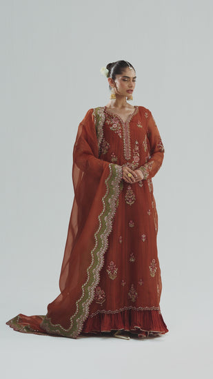 Video of Mannam Rust Set — burnt orange pure organza side-slit Pakistani formal suit with crushed skirt and scalloped dupatta