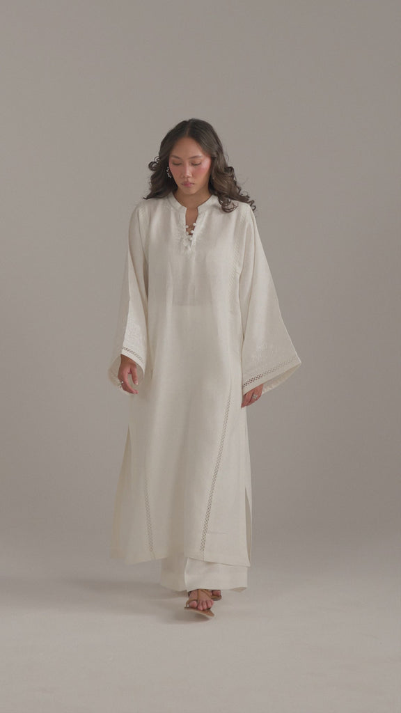 Video of model in the Noor Set, aari embroidery and lace insert detail in motion