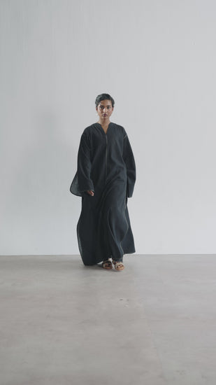 Video of Mannam Ebony Kaftan Set — black linen-cotton Pakistani kaftan with wide sleeves and straight trousers