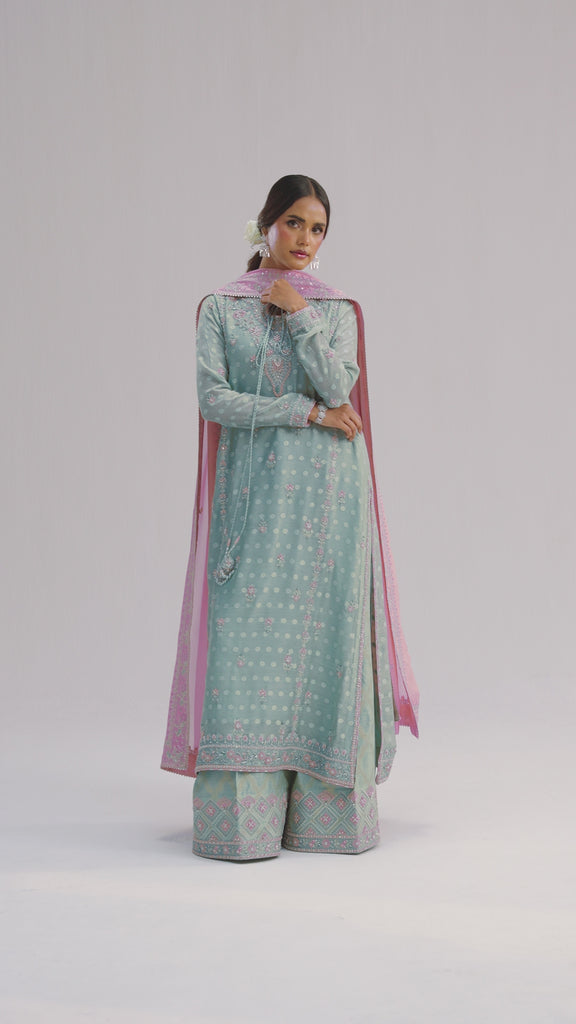 The Azure Set is an ice mint Pakistani kameez in jacquard khadi net with multicolour resham embroidery, hand-placed crystals, and beadwork, available to pre-order with free UK delivery from Mannam.