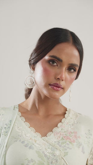 Elegant pastel Pakistani wedding suit with ivory embroidery and pearl accents — timeless designer wear for womens